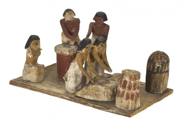 A wooden tomb model of a bakery from Beni Hassan, Egypt [A.1914.71]. © National Museums Scotland